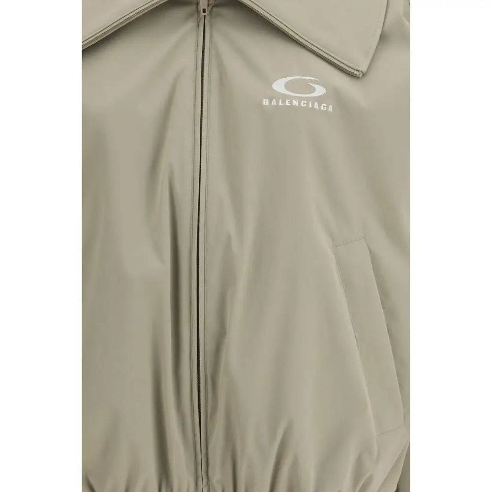 Balenciaga beige polyester jakke med minimalistisk logo på brystet