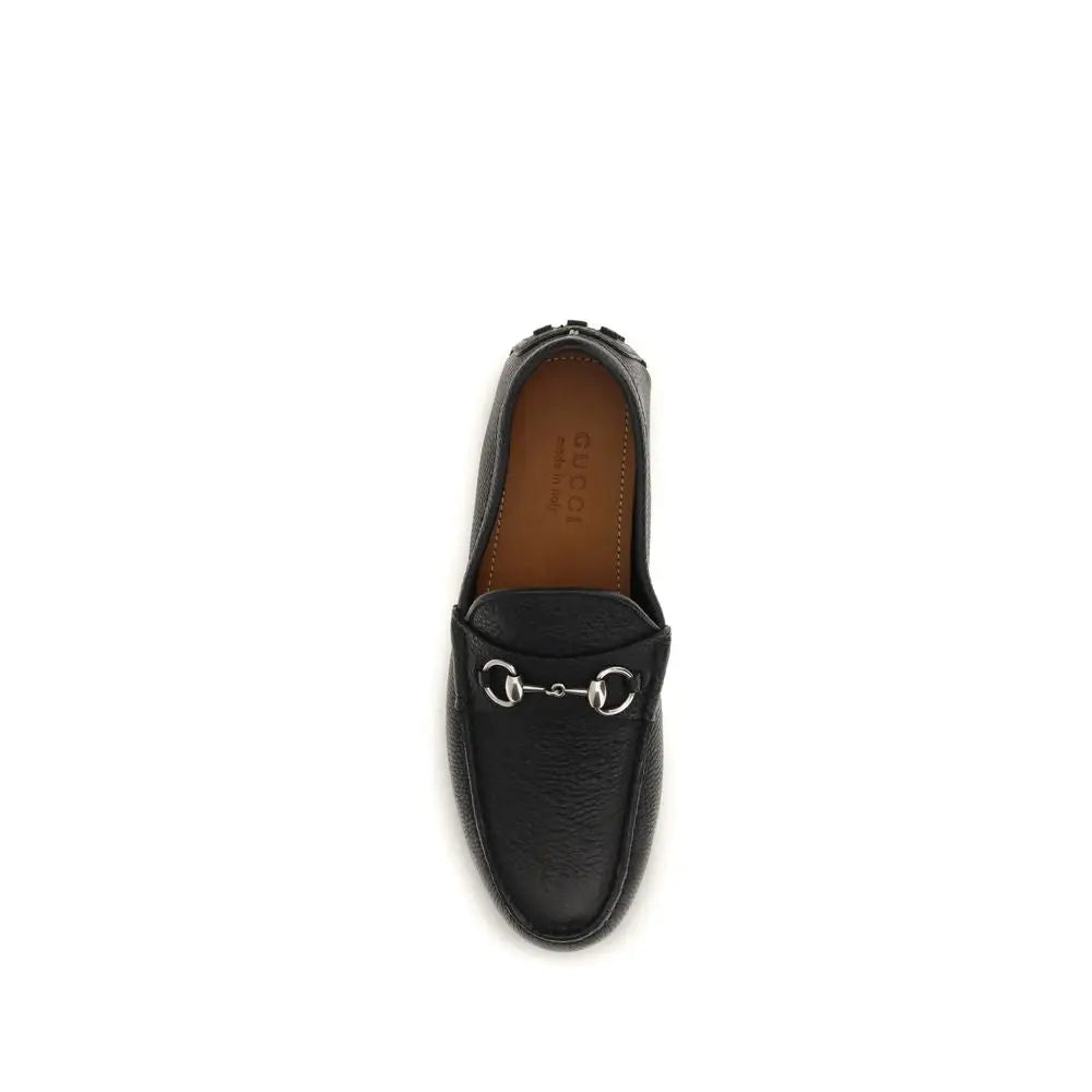 Gucci black calf leather Bos Taurus slip-on loafers with silver horsebit buckle