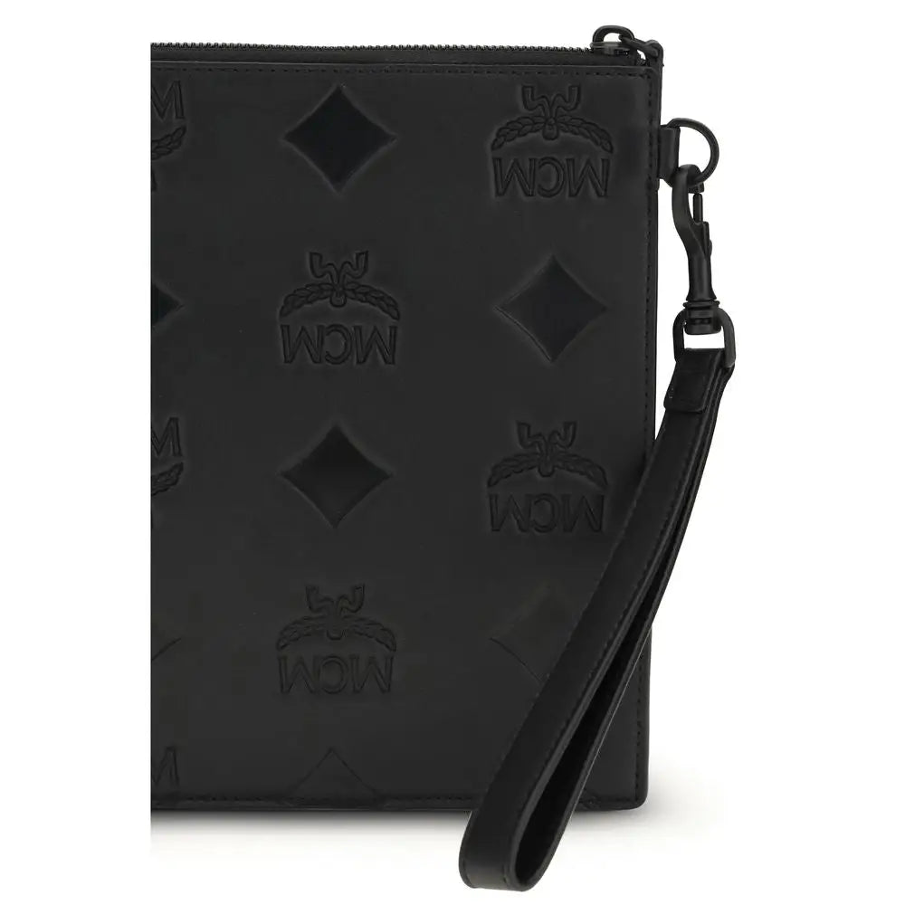 Sort MCM black calf leather Bos Taurus clutch with embossed logo wristlet and detachable strap