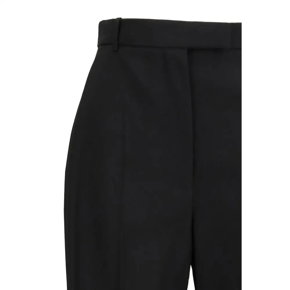 Alexander McQueen sorte bomuld dress pants med struktur og folder