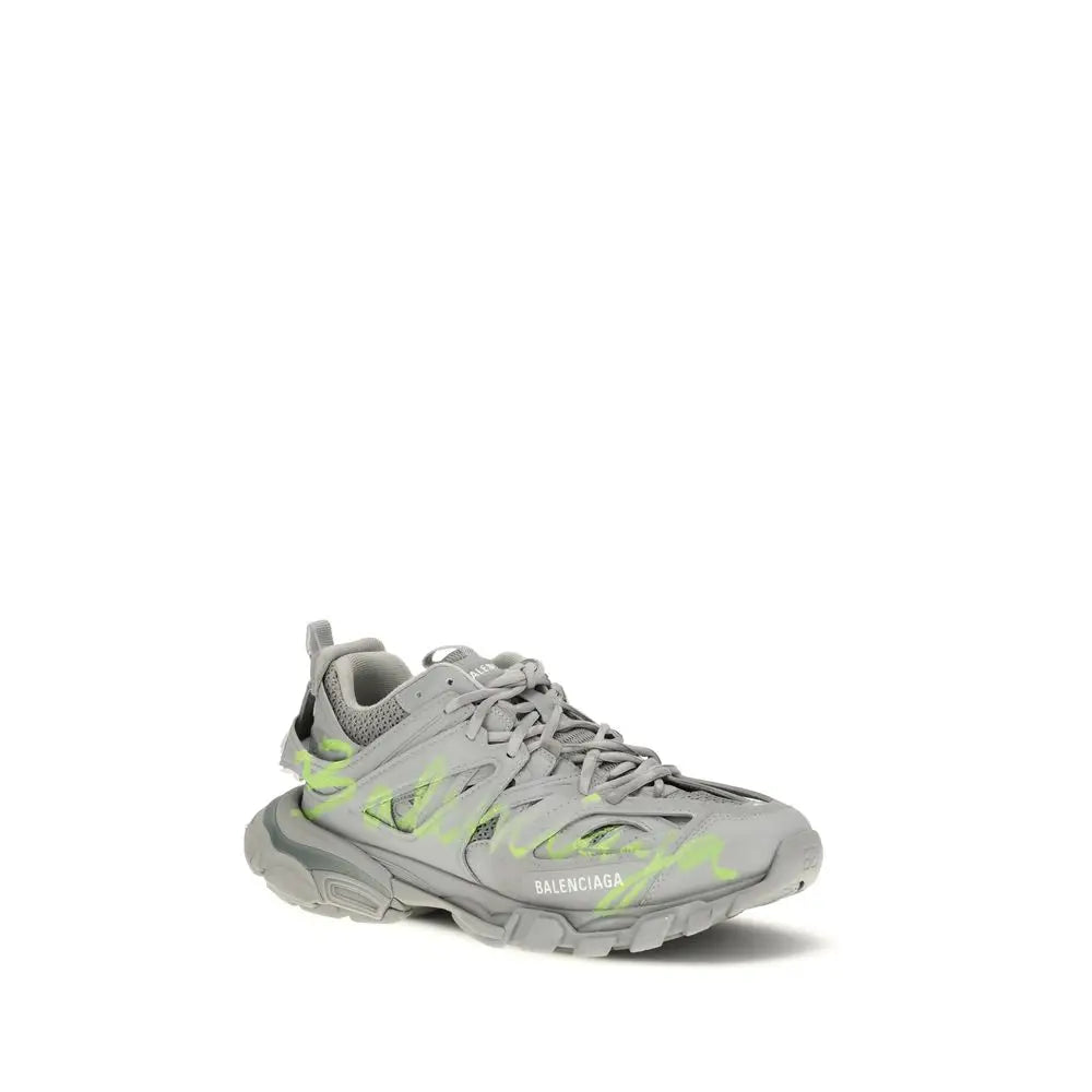 Grå Balenciaga Triple S polyester sneakers med neon graffiti og chunky sål, 100% originale