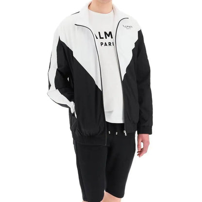 Balmain sorte polyamid shell jacket med diagonale paneler og lynlås