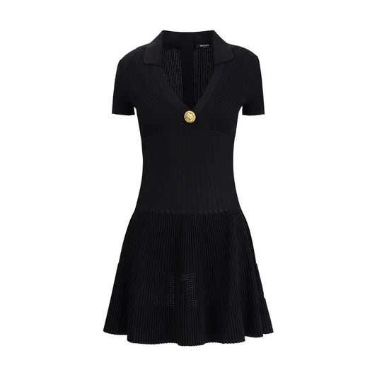 Balmain black viscose casual dress med ribbet strik, plisseret nederdel og guldknap