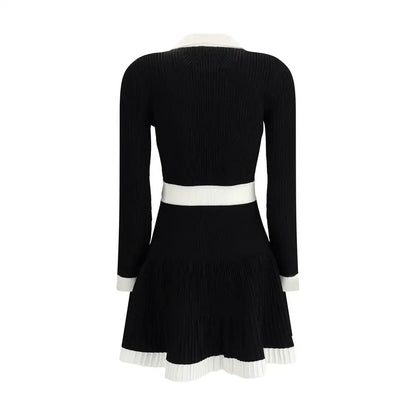 Balmain knit short dress med sort ribbet strik, hvid krave, taljebånd og volan-kant