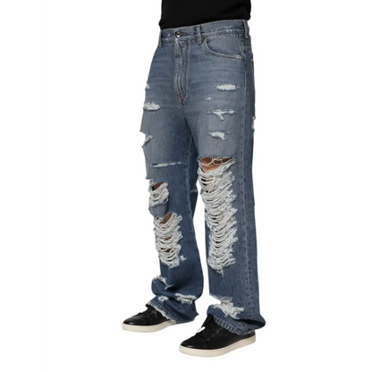 Distressed Dolce & Gabbana blue tattered cotton logo plaque denim jeans