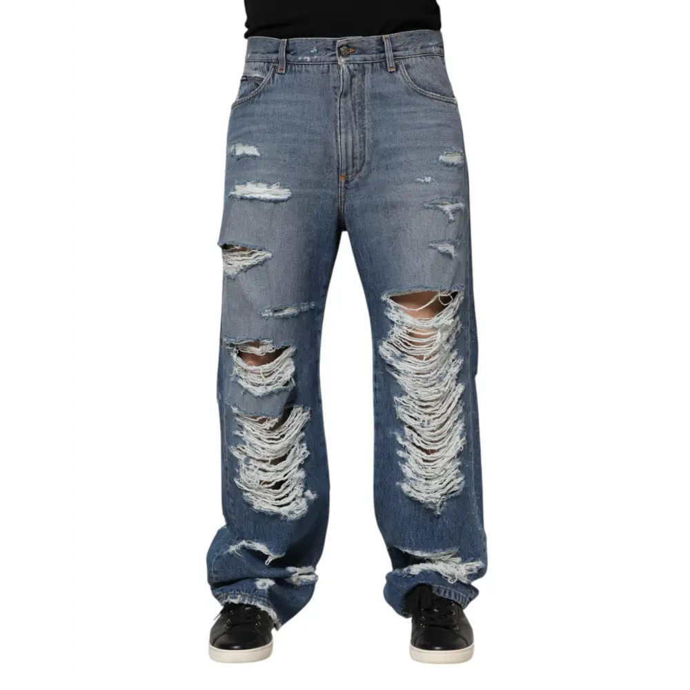 Distressed Dolce & Gabbana blue tattered cotton logo denim jeans med revner