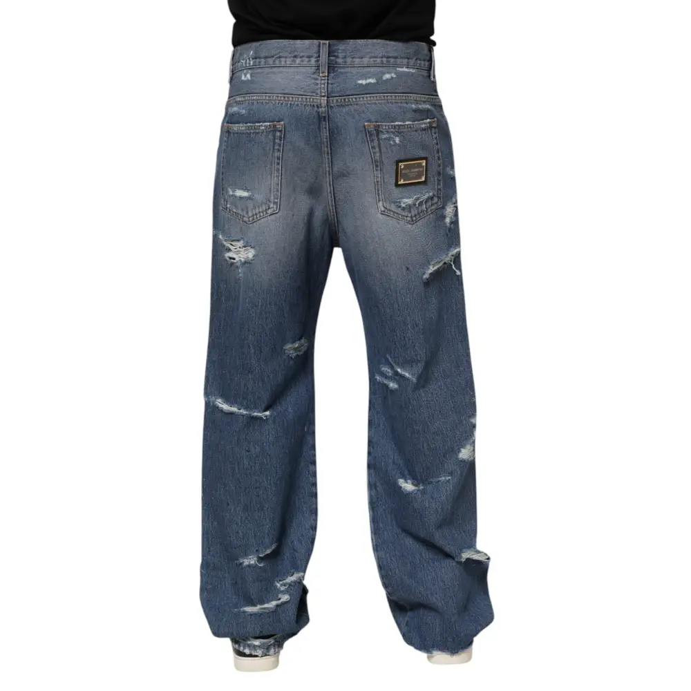 Distressed Dolce & Gabbana blue tattered cotton logo denim jeans med wide-leg