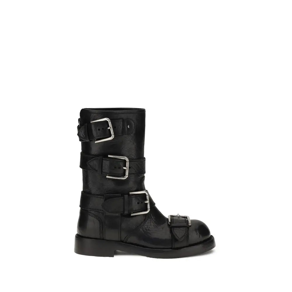 Dolce & Gabbana buckled leather boots in black with silver buckle straps
