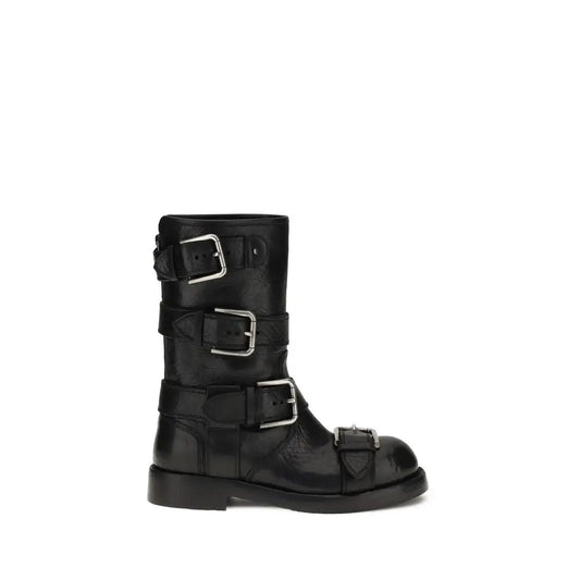 Dolce & Gabbana buckled leather boots in black with silver buckle straps