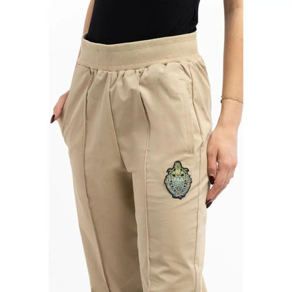 Fila grønne bomuldsjoggers med beige logo, elastik talje og side lommer