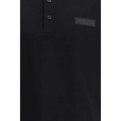 Givenchy sort bomuldspolo med sølvknapper og tekstureret etiket. Outlet mærkevarer, spar 30-70%