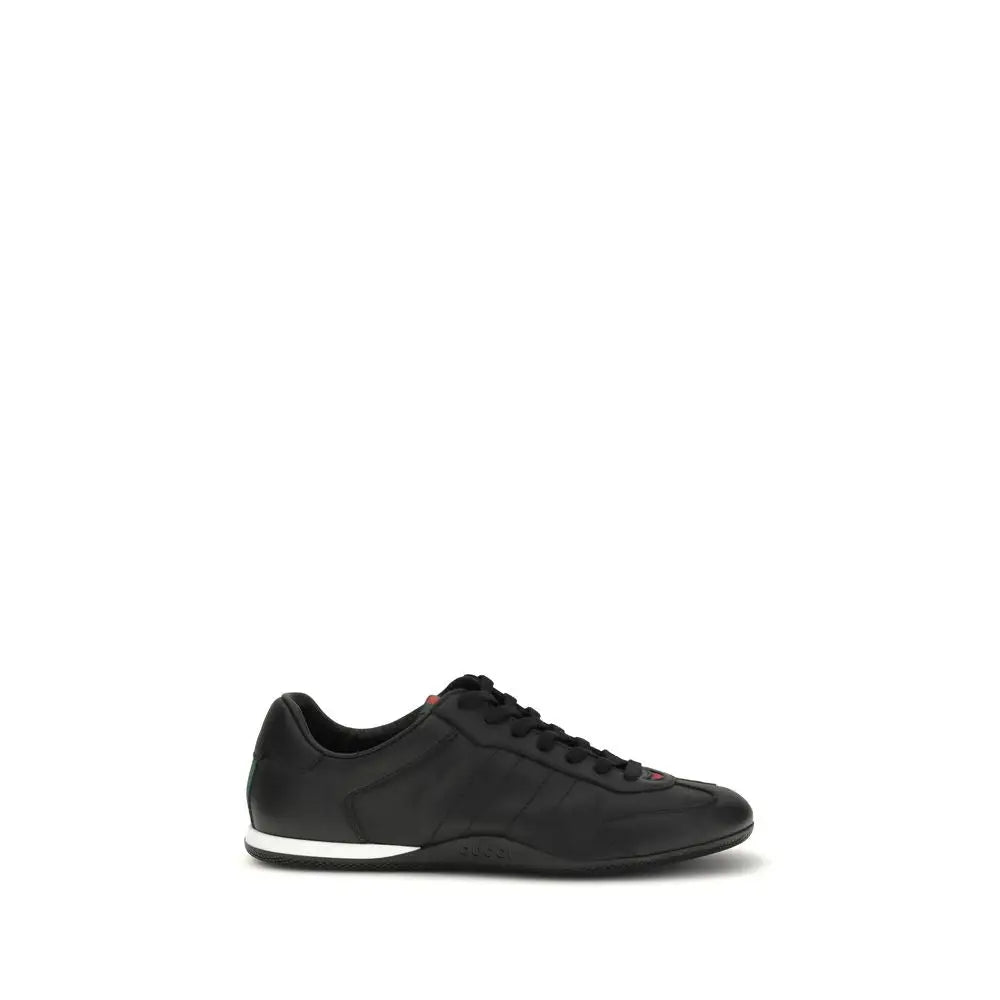Gucci black calf leather Bos Taurus low top sneakers with white sole and red laces