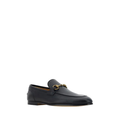 Gucci black calf slip-on loafers with gold horsebit buckle