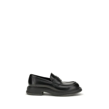 Gucci black calf læder Bos Taurus slip-on loafers med glanset finish og chunky sål