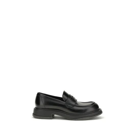 Gucci black calf læder Bos Taurus slip-on loafers med glanset finish og chunky sål