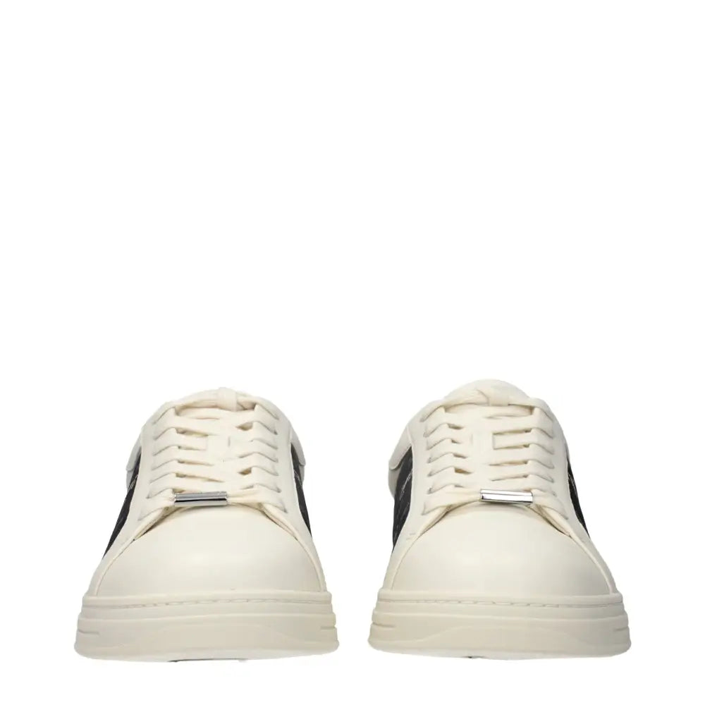 Jimmy Choo beige læder low top sneakers i cremfarvet med sorte sider og sølvøjer