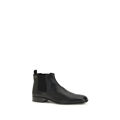 Prada sorte gognskind ankle boots med elastikpaneler og poleret læderfinish. 100% originale brands