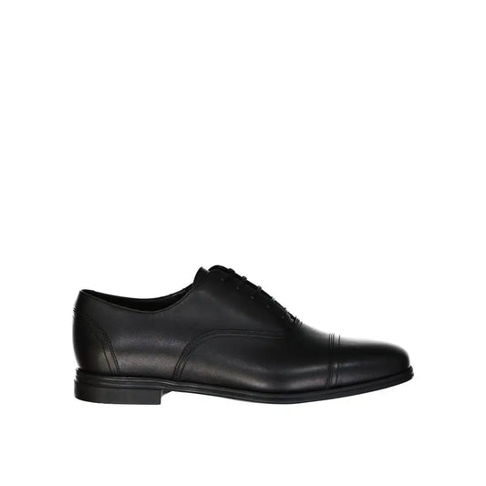 Salvatore Ferragamo sorte læder oxfords med cap-toe og poleret finish