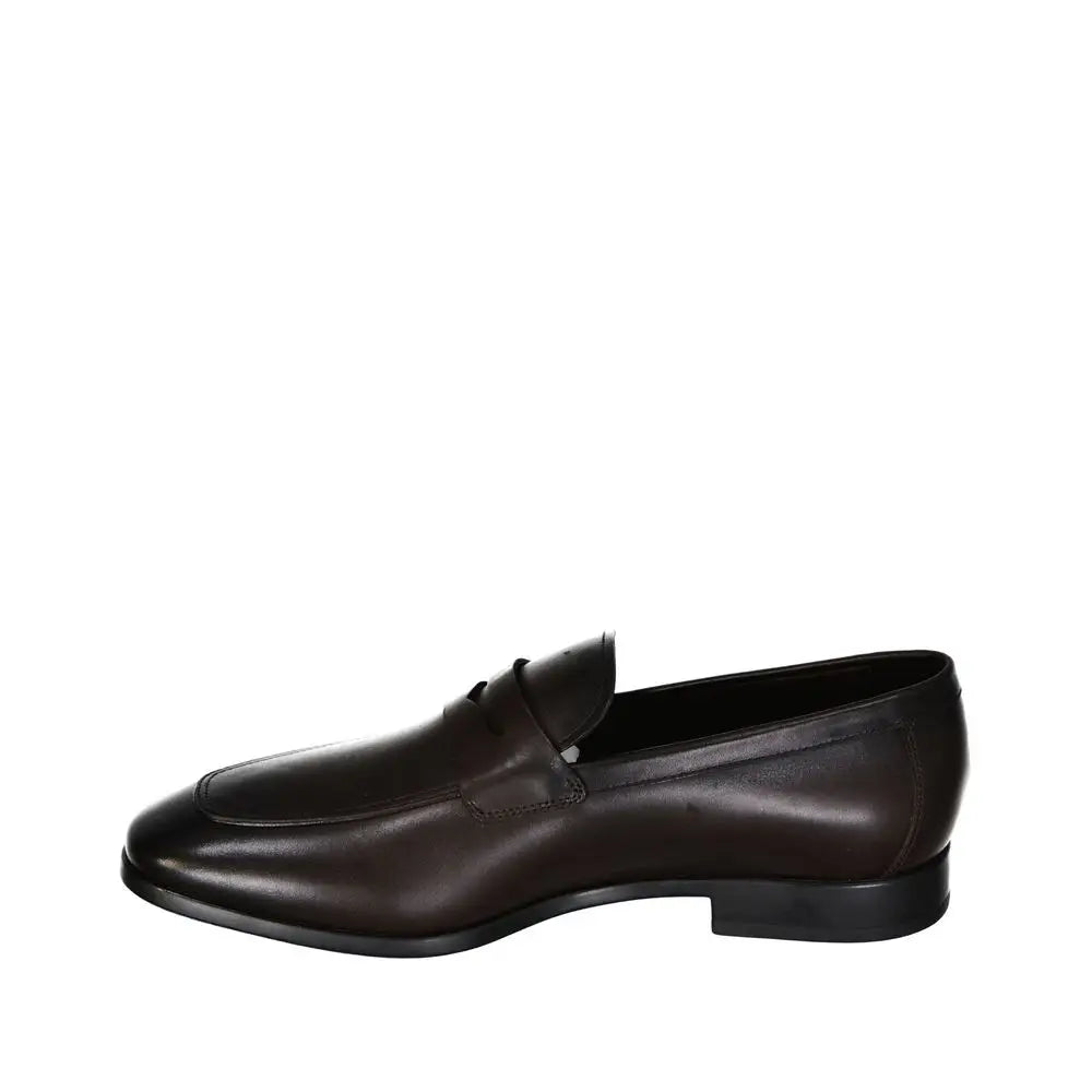 Salvatore Ferragamo brun læder slip-on loafers med poleret finish