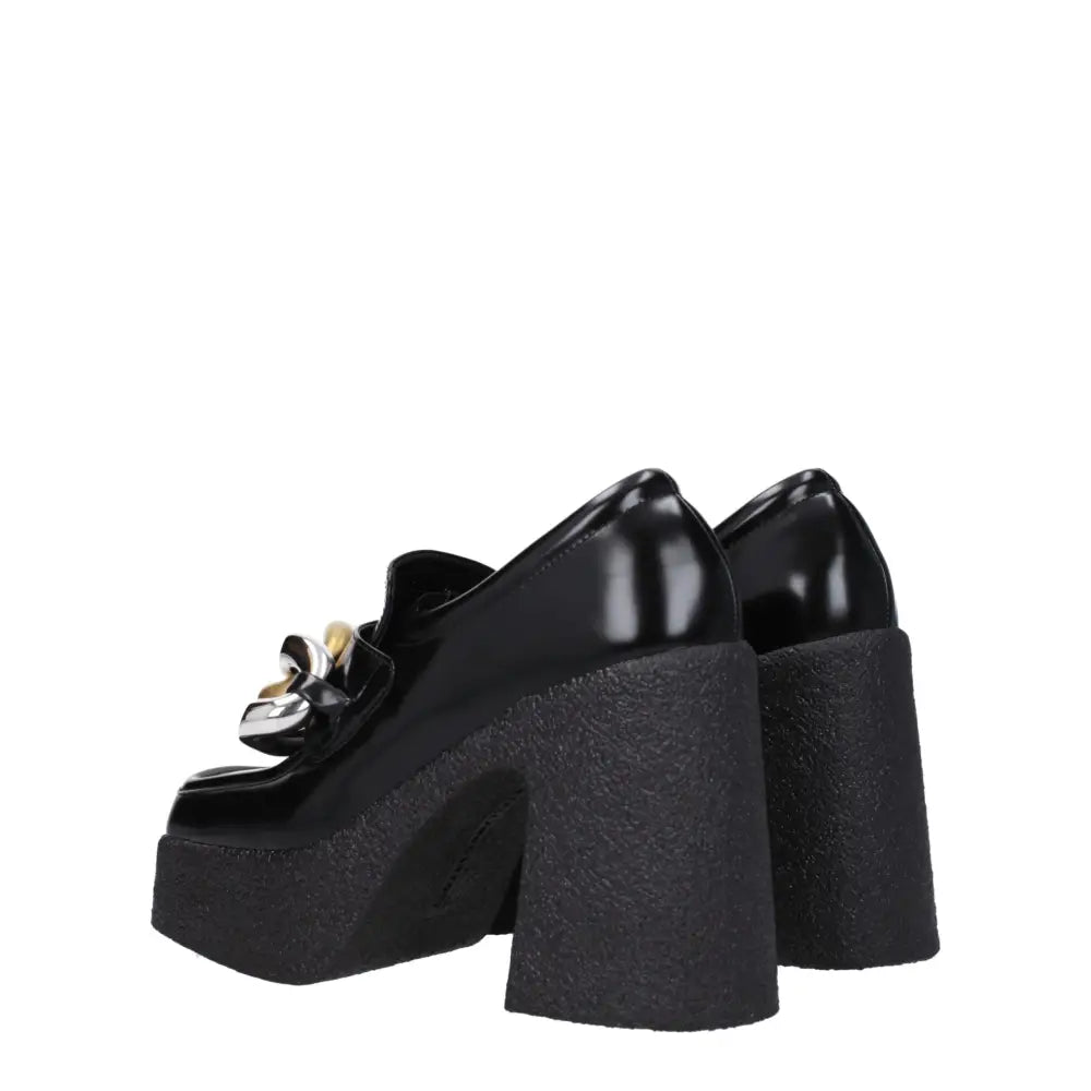 Stella McCartney black læder platform loafers med patentovertræk og tekstureret hæl