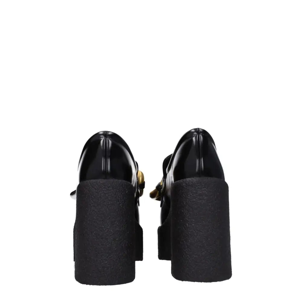 Stella McCartney black leather platform loafers med guldtonede spænder