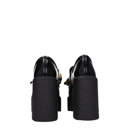 Stella McCartney black leather platform loafers med guldtonede spænder
