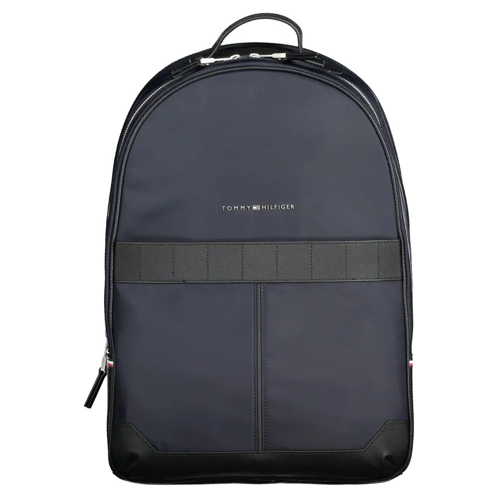 Tommy hilfigers blå backpack i mørk marine med sort trim og logo
