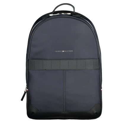 Tommy hilfigers blå backpack i mørk marine med sort trim og logo